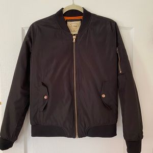 Black Bomber Jacket with Orange Lining